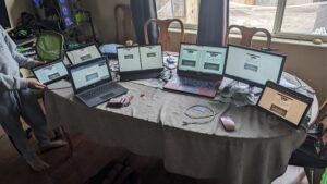 several computer screens out with the reservation loading screen for Starwars celebration 2025 Japan